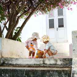 Chapeau anti-UV bébé réversible - Lassig - Orange sel
